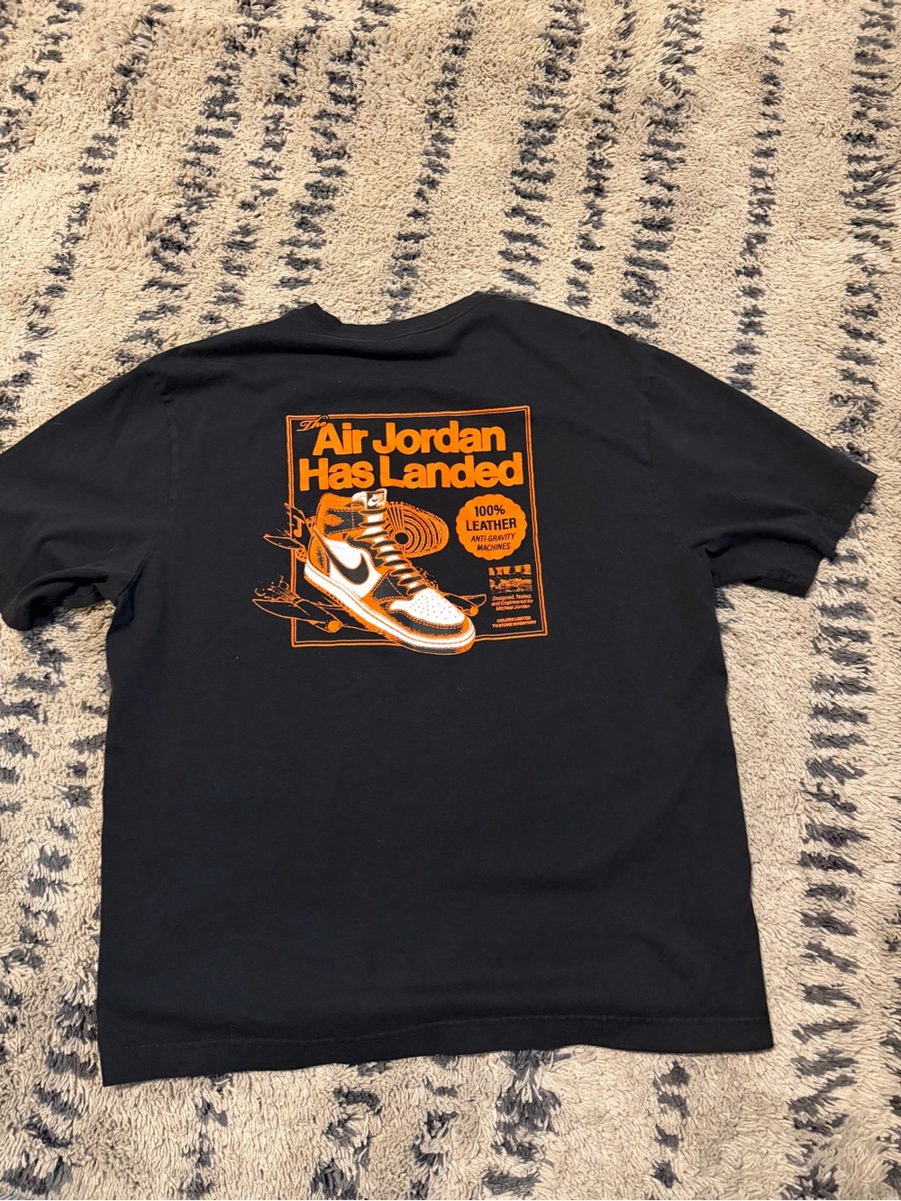 Jordan Black Tee with Red Jumpman Logo